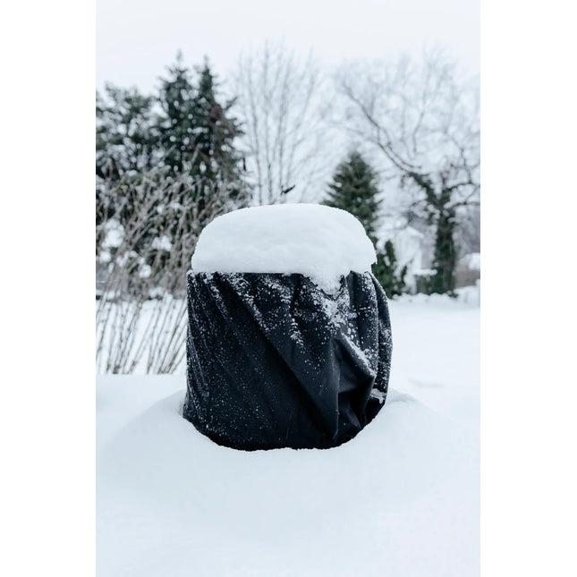 Vuurschaal met Espegard beschermhoes in de sneeuw