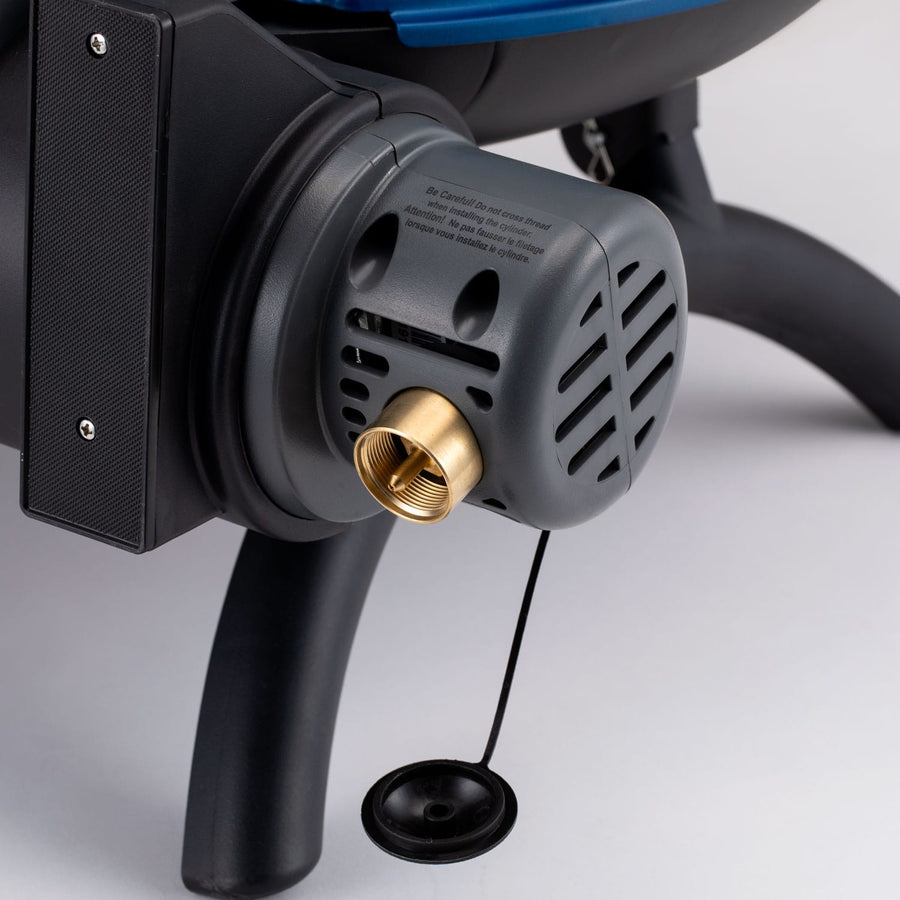 O-Grill aangesloten op een gasfles via de gasslang